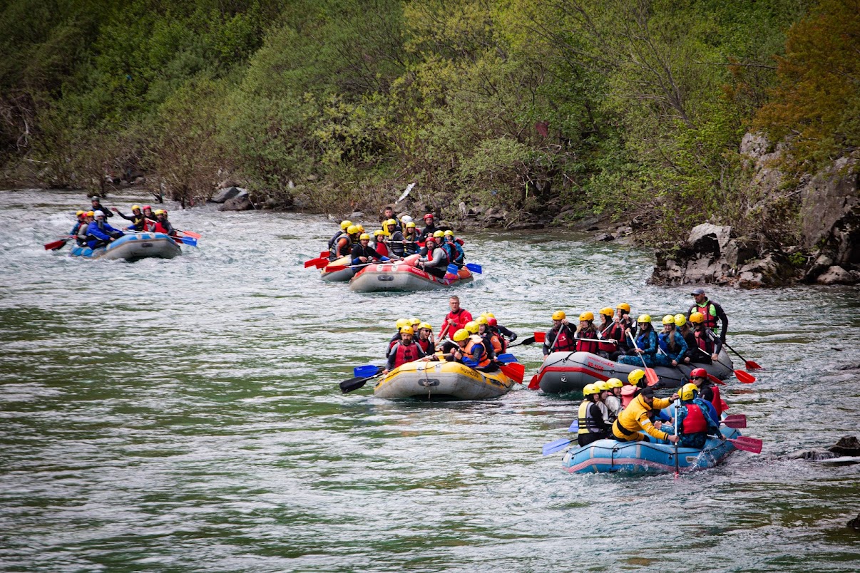 Several rafting boats on a river
